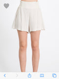 The Lucy flare smocked short in natural